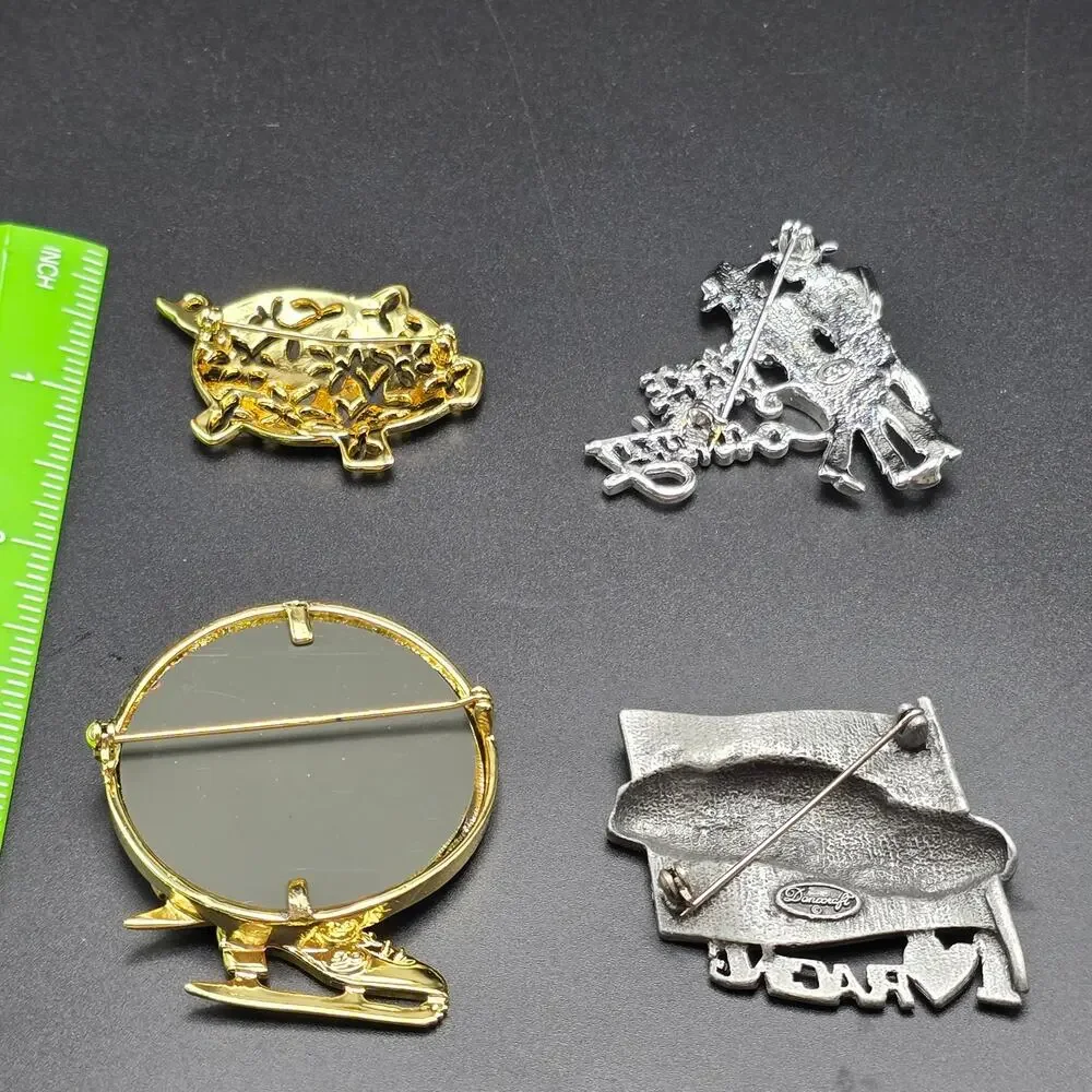 Vintage Danecraft Brooches lot of 4 gold and silver tone